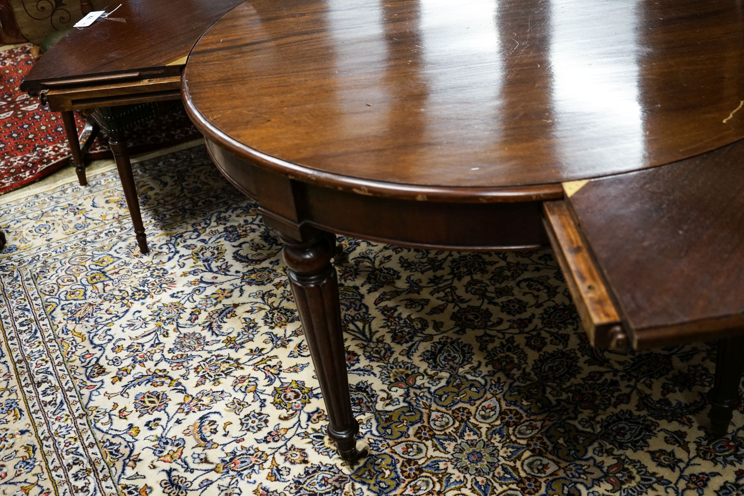 A Victorian and later circular mahogany extending dining table, 170cm diameter, height 70cm